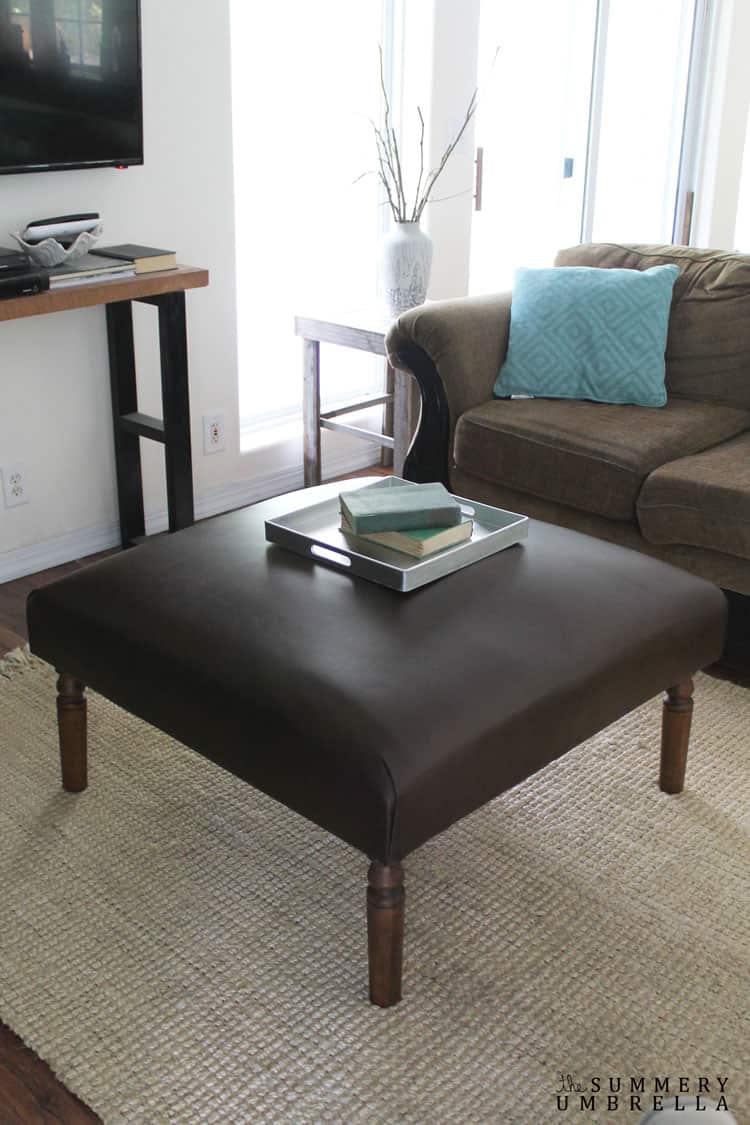 Kickback, relax, and put your feet up on your very own DIY leather ottoman! It's so easy to make you're going to wonder why you haven't tried it before.