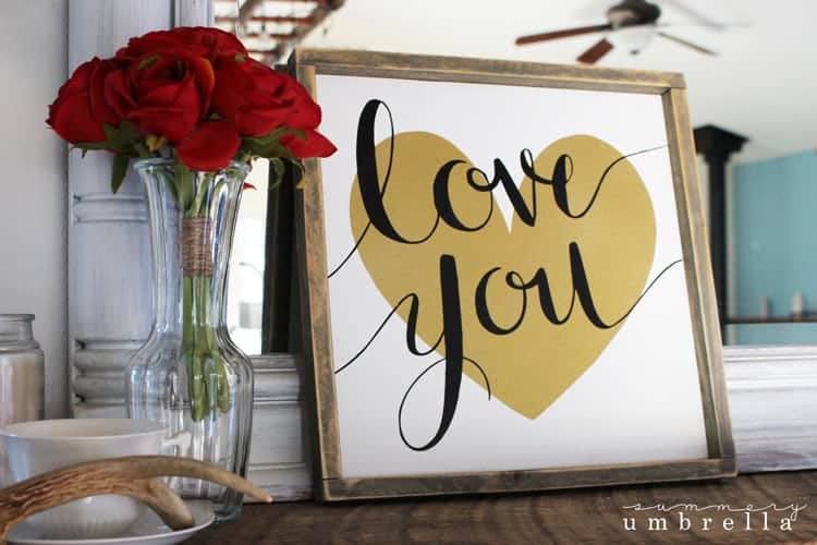 Looking for an easy Valentine's Day project for your home decor? Try this DIY Love You Sign that is great for the upcoming holiday and all year round too!