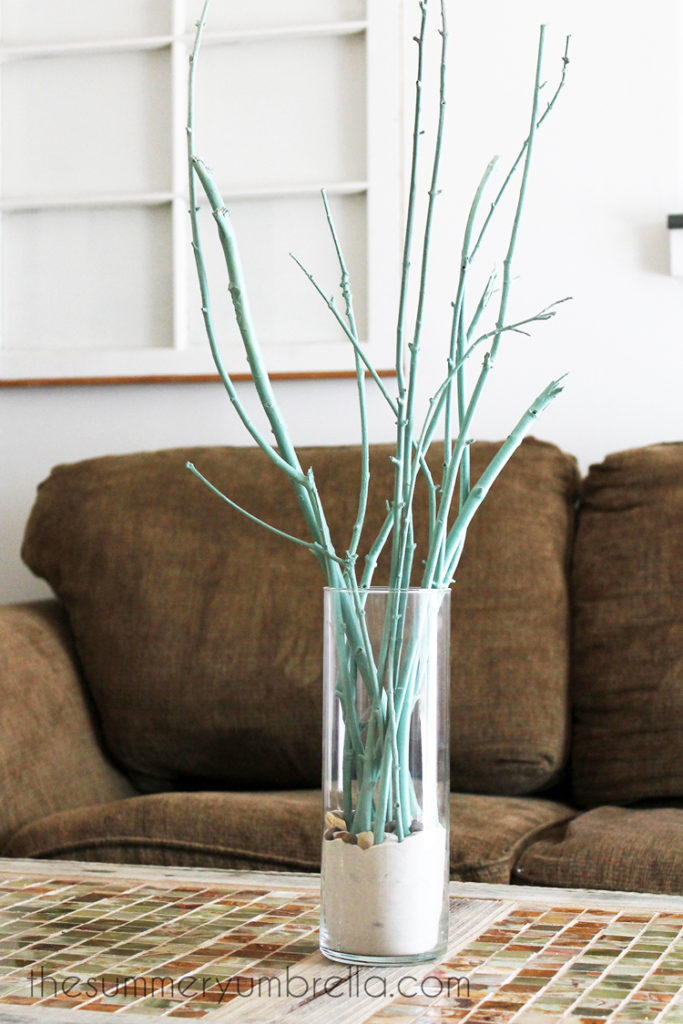This tree branch centerpiece idea is sure to be a new favorite in your home!