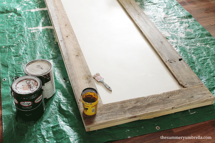 Designing your own custom DIY reclaimed wood paneled door doesn't have to be a chore. Let me show you how to make one now!