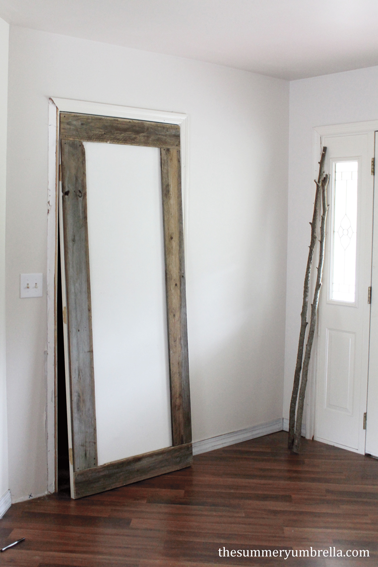 This beautiful DIY reclaimed wood door is not only unique and interesting, but super simple to create as well!