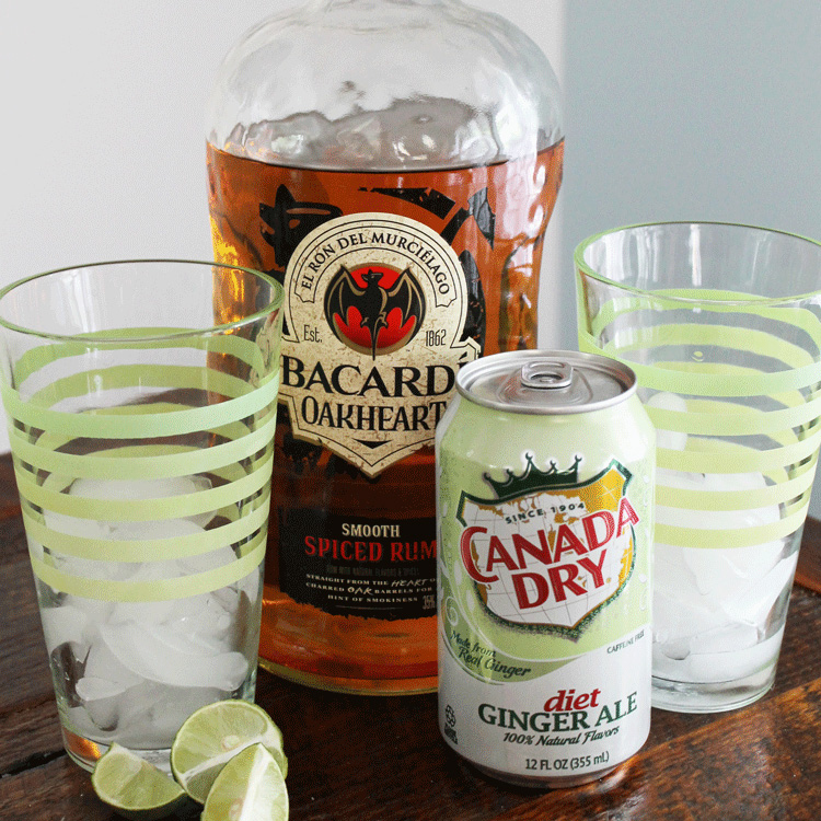 Upgrade your traditional Dark and Stormy with a touch of ginger ale. Get the recipe and try it tonight! #darkandstormy #gingerale #cocktailrecipes #drinkideas