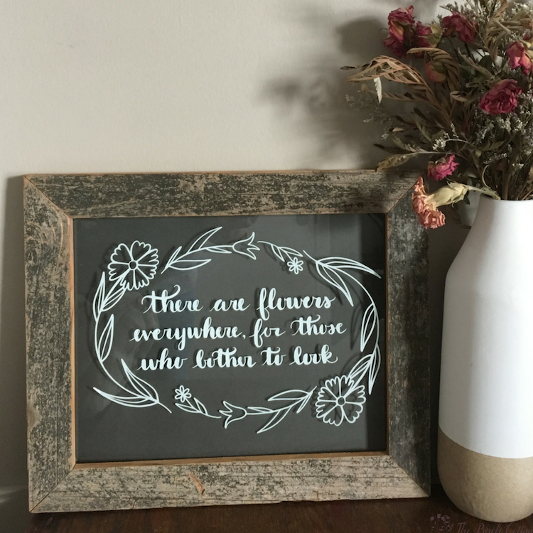 Learn how to make a There are Flowers Everywhere DIY Glass Sign for your home, as a gift for a wedding or any occasion. You can easily make this wall decor from a picture frame or old windows. #silhouette #svgfiles #thesummeryumbrella