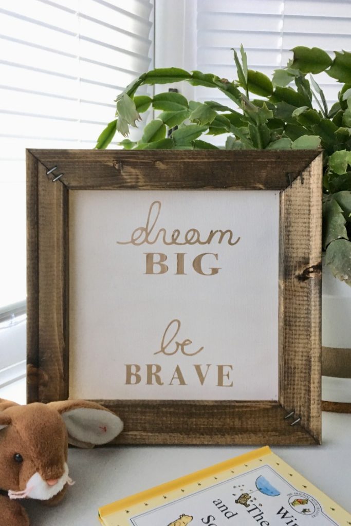 Learn how to make a reverse canvas sign or wall art using an artist canvas, some paint or stain, heat transfer vinyl, and an SVG design for your Cricut or Silhouette with this easy DIY tutorial.﻿ #cricutcrafts #diysigns #thesummeryumbrella