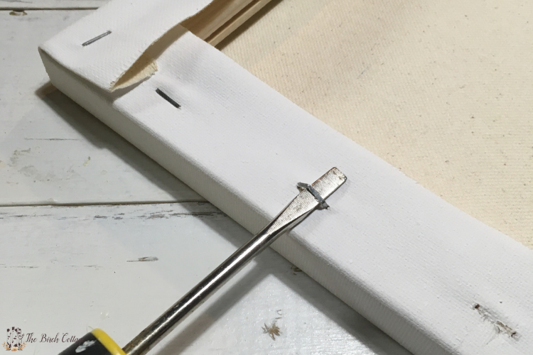 removing staples from canvas for reverse canvas sign or wall art