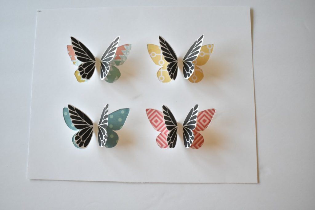 printed butterflies on colorful scrapbook paper