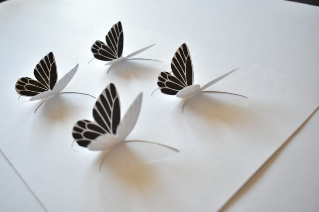 butterfly art getting cut from cardstock