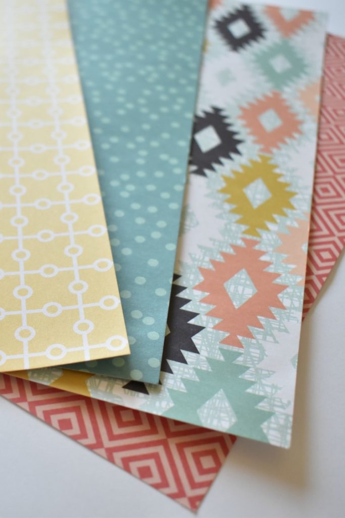 scrapbook paper in 4 different patterns