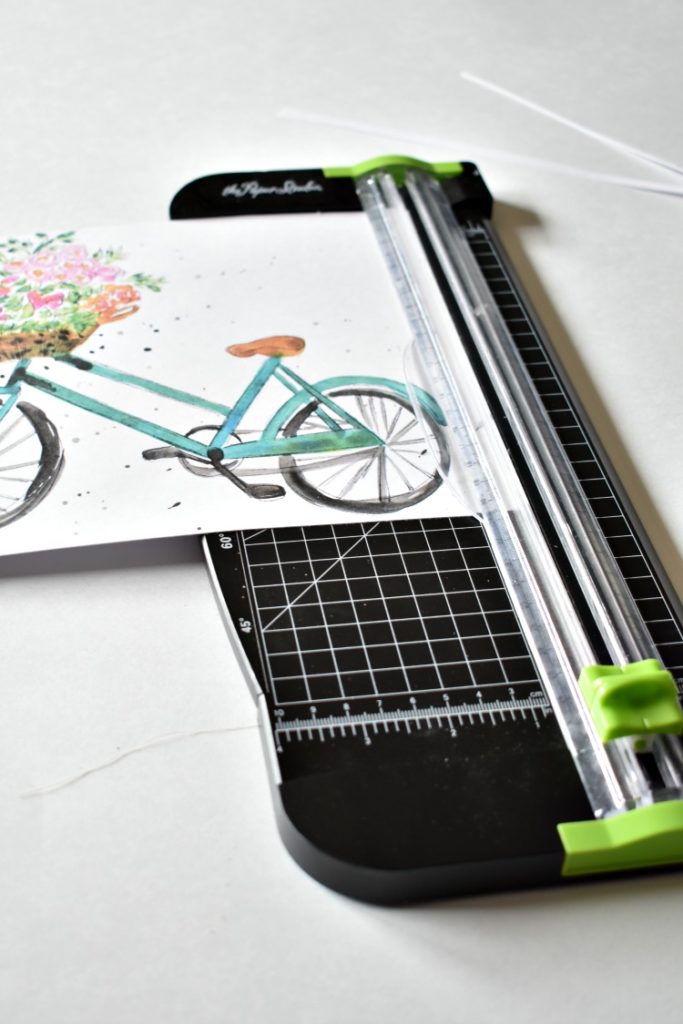 paper cutter cutting watercolor bicycle