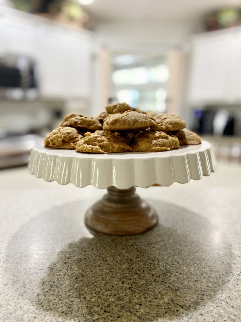 Indulge in Pumpkin Spice Cookies crowned with Cream Cheese Icing! 🍪❤️ #BakeJoy #TastyCombo #FlavorfulBites